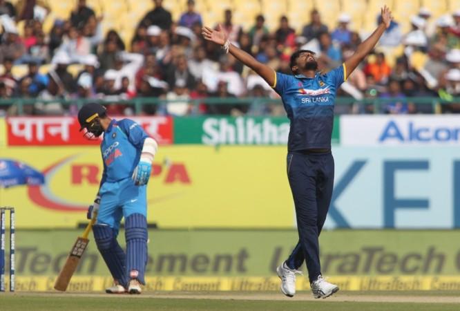 Lakmal (R) picked up four wickets to help Sri Lanka restrict India to 112 Suranga Lakmal