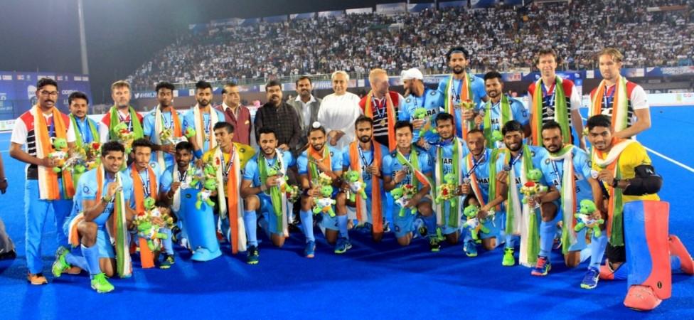 Indian players with Odisha Chief Minister Naveen Patnaik after winning bronze-medal playoff of the Hockey World League (HWL) Final Hockey World League Final
