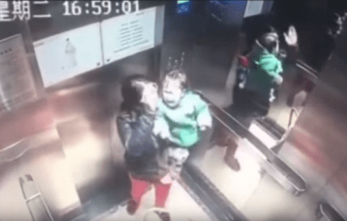 The babysitter is seen first threatening the baby with a raised hand. babysitter