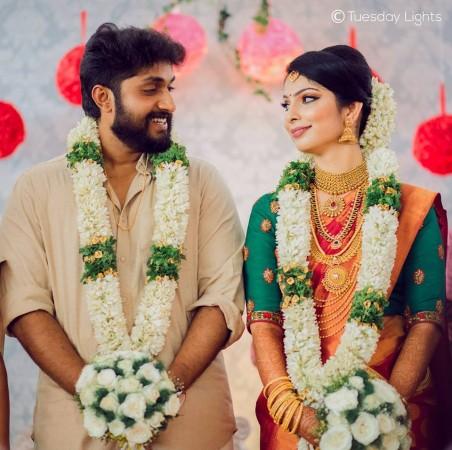 Dhyan Sreenivasan and Arpita Sebastian on their wedding day Dhyan Sreenivasan, Arpita Sebastian