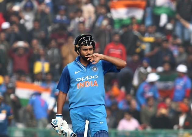 India captain Rohit Sharma celebrates his century in Mohali. He carried on to score 208 not out. Rohit Sharma