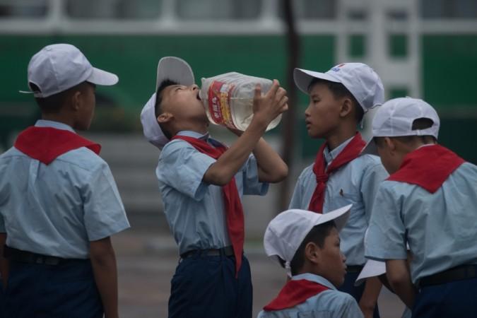Representative Image Students drinking water
