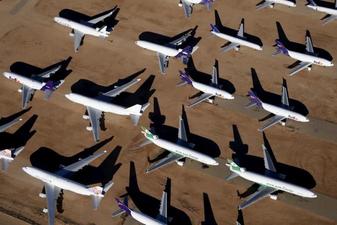 Old airplanes, including Boeing 747-400s, are stored in the desert in Victorville, California March 13, 2015. Old airplanes, including Boeing 747-400s, are stored in the desert in Victorville, California March 13, 2015.