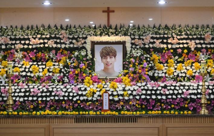 The portrait of Kim Jong-Hyun, a 27-year-old lead singer of the massively popular K-pop boyband SHINee, is seen on a mourning altar at a hospital in Seoul on December 19, 2017. Kim Jonghyun