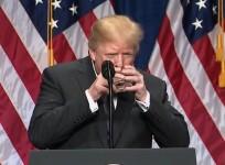 Trump drinks water with two hands like a child during big speech on national security
