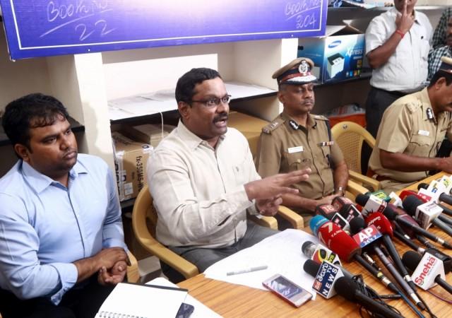 In picture: Returning Officer Praveen Nair addresses a press conference to tell television channels to not to telecast the video clip of the late J Jayalalithaa purportedly on her hospital bed, in Chennai on December 20, 2017. A day ahead of a critical by-election in Chennai, sidelined AIADMK leader TTV Dinakaran's faction on Wednesday triggered a major row by releasing the video clip. RK Nagar byelection