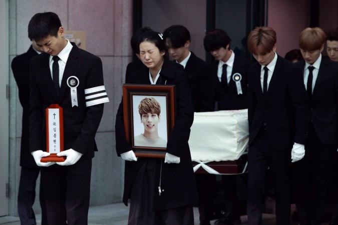 Members of pop Idol SHINee and Super Junior carry the coffin containing the body of Jonghyun of SHINee during the funeral at the hospital on December 21, 2017 in Seoul, South Korea. Kim Jonghyun body