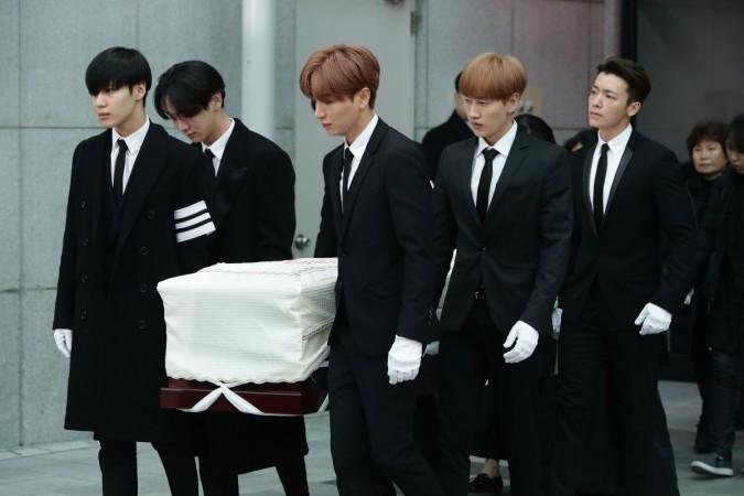 Members of pop Idol SHINee and Super Junior carry the coffin containing the body of Jonghyun of SHINee during the funeral at the hospital on December 21, 2017 in Seoul, South Korea. Kim Jonghyun body