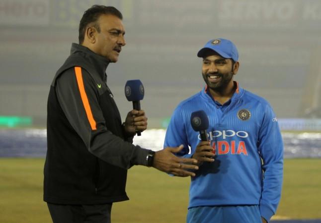 File photo: Shastri (left) interviews India's stand-in captain Rohit Sharma in Mohali after the batsman hit a double century in ODIs, against Sri Lanka, on December 13. Ravi Shastri Rohit Sharma
