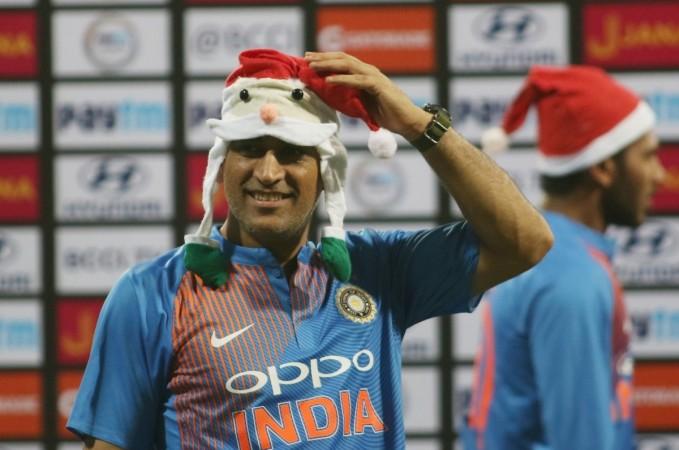 MS Dhoni wears a Santa Claus cap after India's victory over Sri Lanka in Mumbai on Sunday night (December 24). MS Dhoni