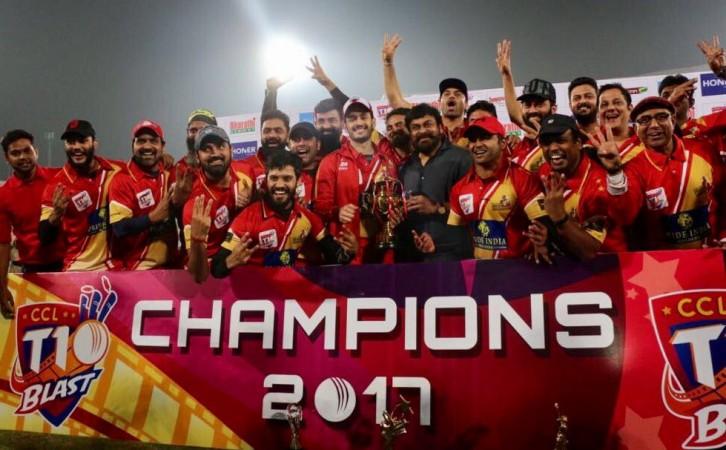 Akhil Akkineni receives CCL trophy from Chiranjeevi