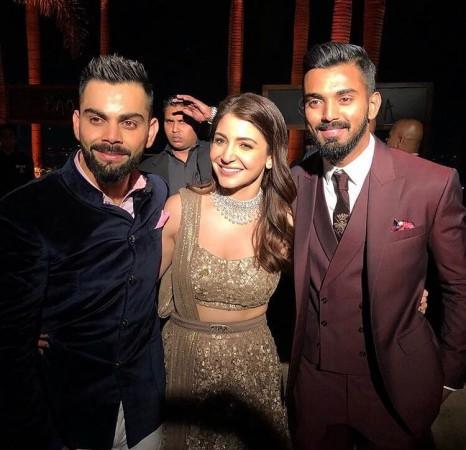 Virat Kohli, Anushka Sharma with Indian cricketer KL Rahul during their wedding reception in Mumbai virushka