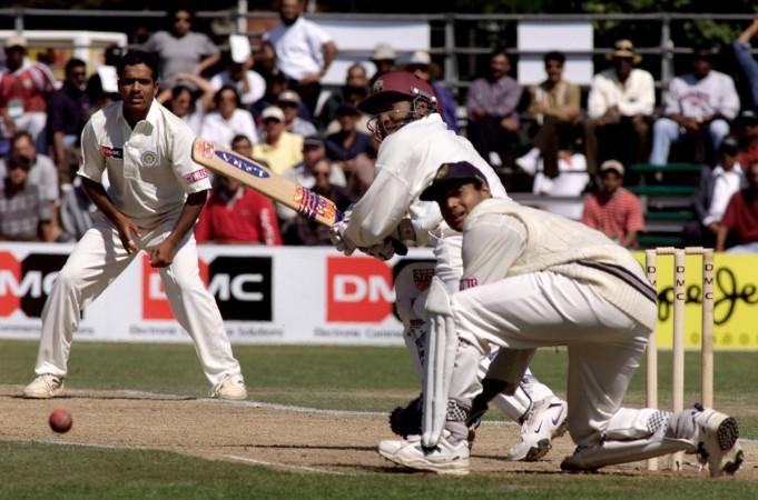 File photo: Sunil Joshi (left) bowls to West Indies' batsman Brian Lara in an ODI match as MSK Prasad watches. Sunil Joshi