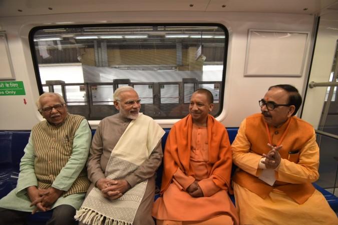 Modi travelling in Magenta Line in Delhi metro along with Yogi Adityanath. delhi metro
