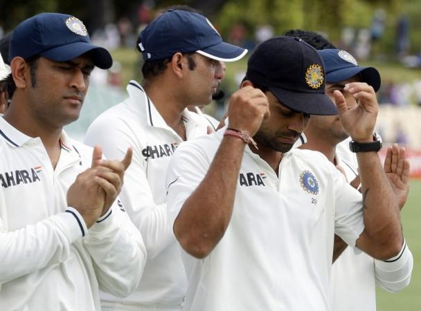 Former Indian captain MS Dhoni (L) and Virat Kohli (3rd R) attend the trophy presentation after Australia won the fourth cricket Test match against India making a clean sweep of the Border-Gavaskar Trophy Series in 2012. MS Dhoni and Virat Kohli