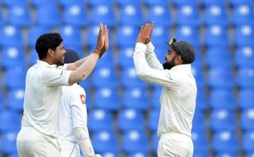 Umesh Yadav and Virat Kohli