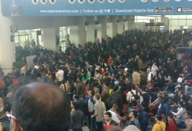 In picture: Crowd at the IGI Airport in Delhi on Sunday, December 31, 2017 after flights were delayed, diverted or cancelled due to fog. Delhi Airport