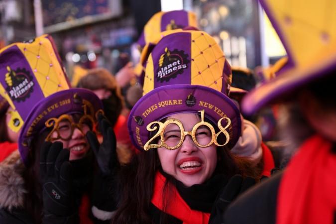 Revelers brace freezing cold temperatures in Times Square ahead of New Year's celebrations in Manhattan, New York. New Year Celebrations
