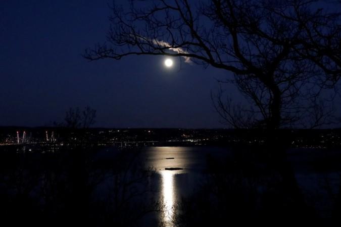 A 'supermoon' full moon is seen above the Hudson River and the Mario M. Cuomo Bridge from Nyack, New York, U.S., January 1, 2018. Supermoon 2018
