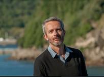 Jerome Salle poses during a photocall after the screening on his film 'L'Odysee' (The Odyssey) at the 64th San Sebastian Film Festival, in the northern Spanish Basque city of San Sebastian on September 24, 2016.