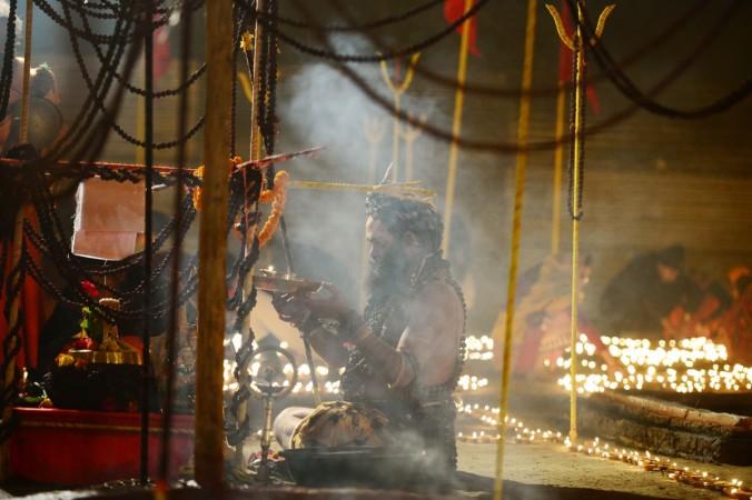REPRESENTATIONAL PICTURE: An Indian Sadhu - holy man - performs religious rituals outside his camp at Sangam during the annual traditional fair Magh Mela at Sangam, the confluence of the rivers Ganges, Yamuna and the mythical Saraswati in Allahabad on January 2, 2018. Sadhu, holy monk, hindu monk
