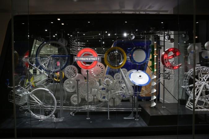 LONDON, ENGLAND - MARCH 16: A display representing the Google name and logo is lit up at night in the window of a branch of PC World on March 16, 2015 in London, England. Google's new shop is selling Chromebook laptops, Android phones, tablets and Chromecast TV devices. Google Opens It's First Shop Inside A Branch of PC World