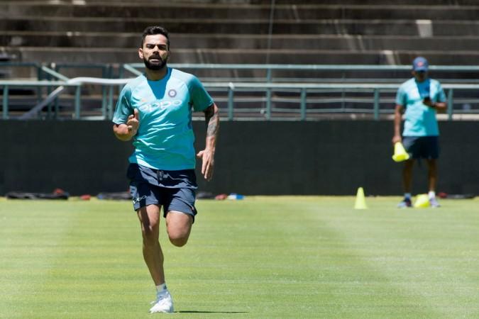 Virat Kohli runs during a training session at the Newlands Cricket ground on January 3, 2018, in Cape Town, prior to the first of three Tests between South Africa and India. Virat Kohli