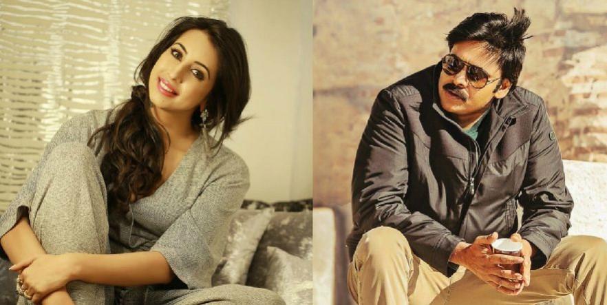 Sanjjanaa Galarani and Pawan Kalyan. Sanjjanaa Galarani and Pawan Kalyan