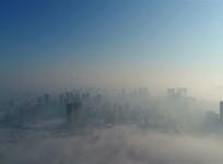 A dense fog makes Chinese city look eerie and mysterious