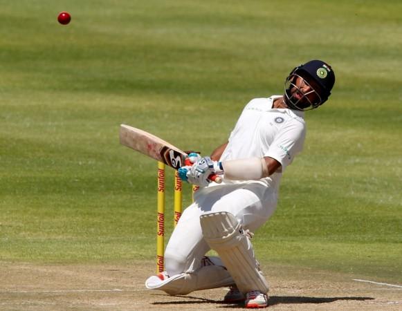 India's Cheteshwar Pujara avoids a bouncer against South Africa in the 1st Test in Cape Town. Cheteshwar Pujara