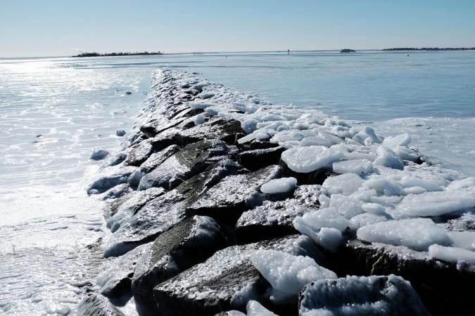 A frozen jetty stands in the icy waters of Long Island Sound as temperatures continue to stay below freezing in much of the Northeast on January 7, 2018 in Westport, Connecticut. The icy waters of Long Island