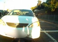 Motorist tries to pay cyclist he just rammed with his car