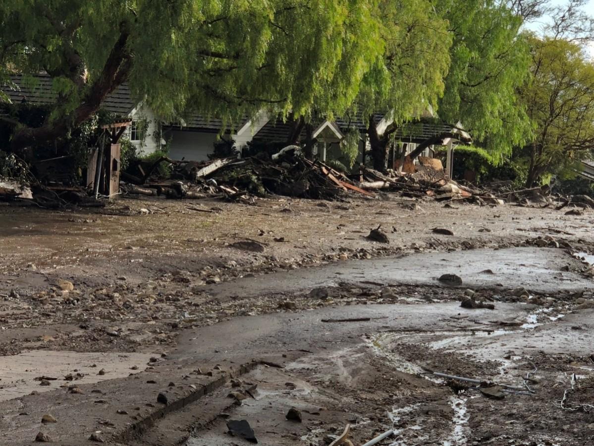 Cottages surrounded by debris and mud after mudslides are seen in Montecito, California California mudslides