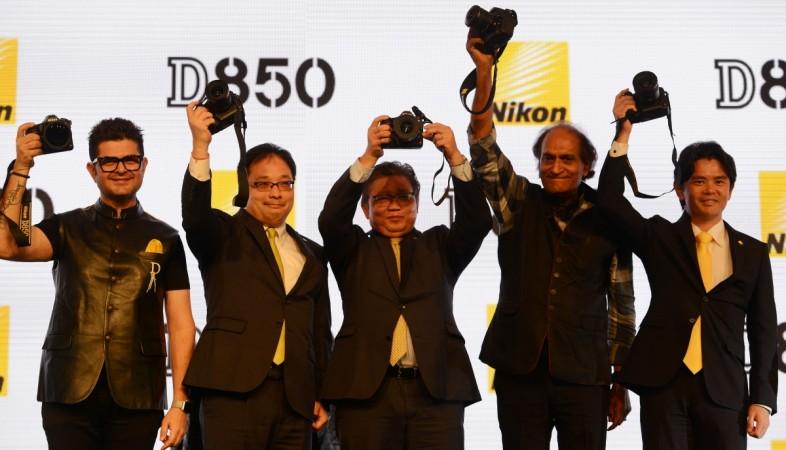 From (L-R), Indian fashion photographer Dabboo Ratnani, Kazuo Ninomiya, managing director of Nikon India, Nikon marketing official Takami Tsuchida, Indian photographer Raghu Rai, and Nikon products manager Masayuki Numako hold the newly launched Nikon D850 camera at an event in New Delhi on September 4, 2017. INDIA-TECHNOLOGY-PHOTOGRAPHY