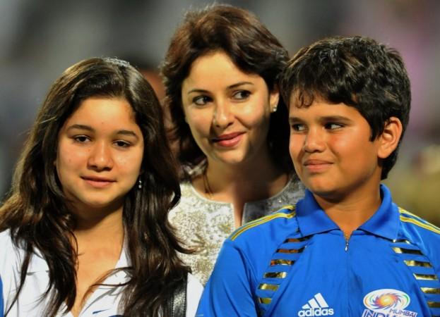 Sachin Tendulkar's wife Anjali with their children Sara and Arjun in 2011 tendulkar family