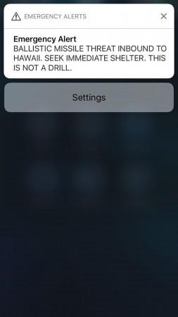 A screen shot take by Hawaiian citizen Alison Teal shows the screen of her mobile phone with an alert text message sent to all Hawaiian citizens Hawaii
