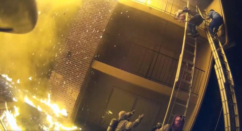 Firefighter catches baby