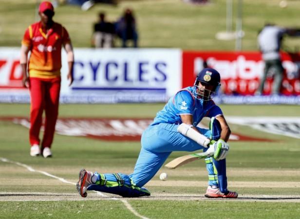 India batsman Faiz Fazal plays a shot during the third and final One Day International (ODI)cricket match between India and hosts Zimbabwe at the Harare Sports Club,in Harare on June 15, 2016 faiz fazal