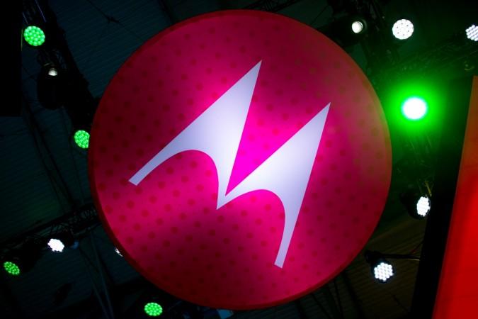 A Motorola logo hangs from a beam during the Mobile World Congress on the third day of the MWC in Barcelona, on March 1, 2017. Phone makers will seek to seduce new buyers with artificial intelligence functions and other innovations at the world's biggest mobile fair starting today in Spain. SPAIN-TELECOM-MOBILE-WORLD-CONGRESS