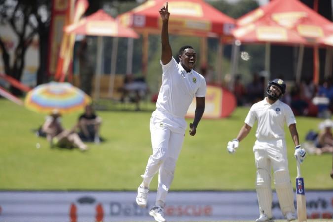 South African bowler Lungi Ngidi (C) celebrates the dismissal of Indian batsman Hardik Pandya during the fifth day of the second Test cricket match between South Africa and India at Supersport cricket ground on January 17, 2018 in Centurion lungi ngidi
