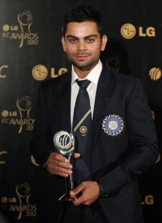 Kohli, winner of the ICC's ODI Cricketer of the Year Award, poses with the trophy during the ICC Awards in Colombo, September 15, 2012. Virat Kohli