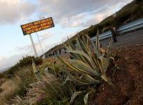 Sign warning residents of water restrictions is seen in Cape Town, South Africa