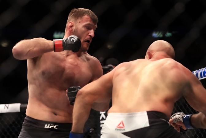 Miocic (L) fighting Junior dos Santos in 2017 stipe miocic