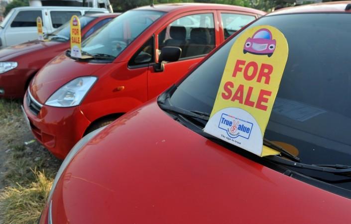 Used cars are parked at the 'Car Carnival' organized to woo buyers during the festive season in Mumbai on October 10, 2011. Second hand cars, pre-owned cars, used cars