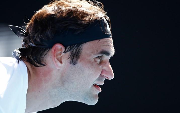Roger Federer of Switzerland waits to receive serve in his fourth round match against Marton Fucsovics of Hungary on day eight of the 2018 Australian Open at Melbourne Park on January 22 federer