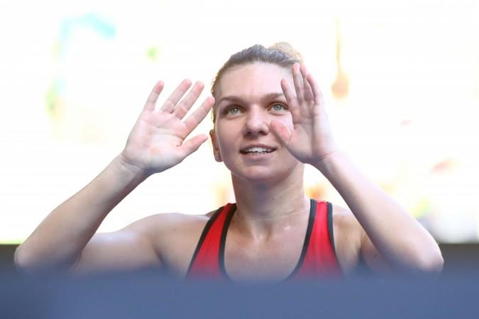 Simona Halep reacts after defeating Angelique Kerber simona halep