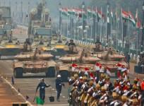 Indian soldiers in tanks take part in a full dress rehearsal for the Republic Day parade