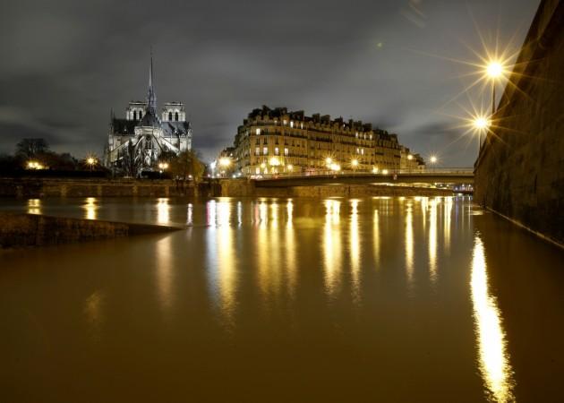 A general view shows the Notre Dame Cathedral at night, on the flooded banks of the River Seine in Paris, France. Paris flood