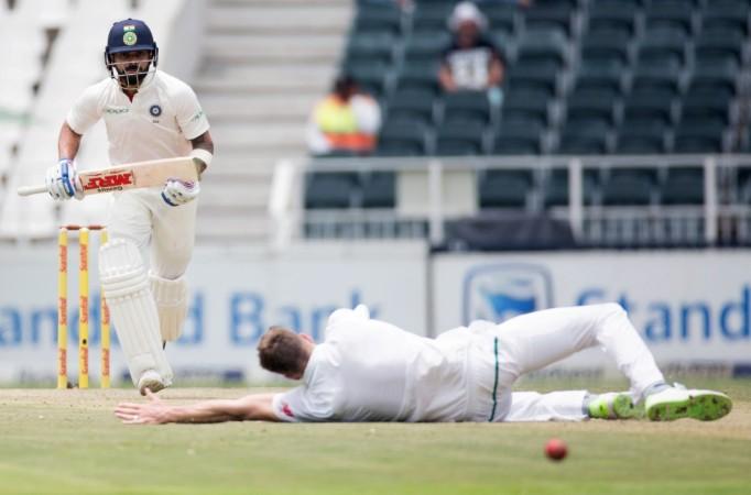 India captain Virat Kohli (left) plays a shot as South Africa bowler Morne Morkel is down on the pitch during the 3rd Test in Johannesburg on January 24. Virat Kohli