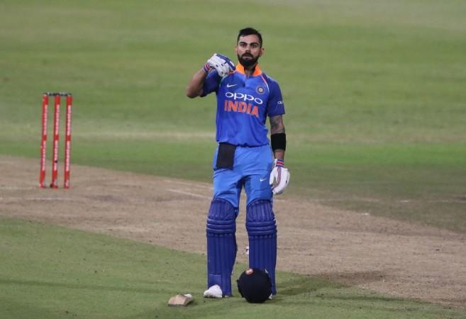 Virat Kohli celebrates after scoring a century during the first ODI between South Africa and India at Kingsmead Cricket Ground on February 1, 2018 in Durban. Virat Kohli in South Africa